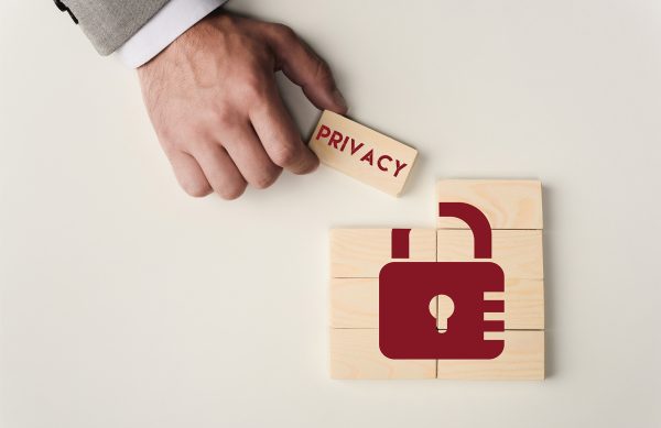 Partial view of man holding brick with privacy l 2026 03 13 01 19 08 utc